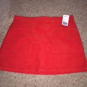 Brand new red corduroy mini skirt